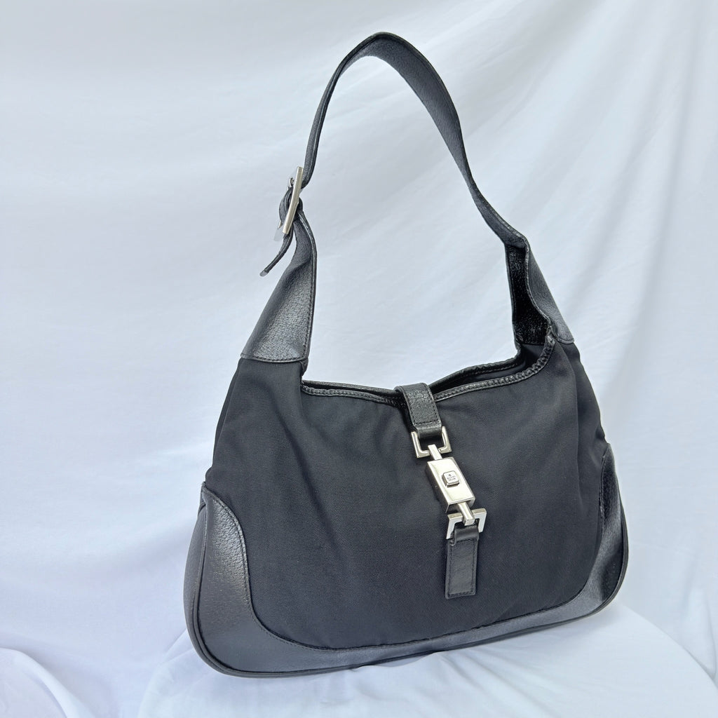 Vintage Gucci Jackie Small Handbag Black Leather And Nylon Piston Push-Lock Silver Closure Single Adjustable Strap