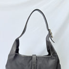Vintage Gucci Jackie Small Handbag Black Leather And Nylon Piston Push-Lock Silver Closure Single Adjustable Strap