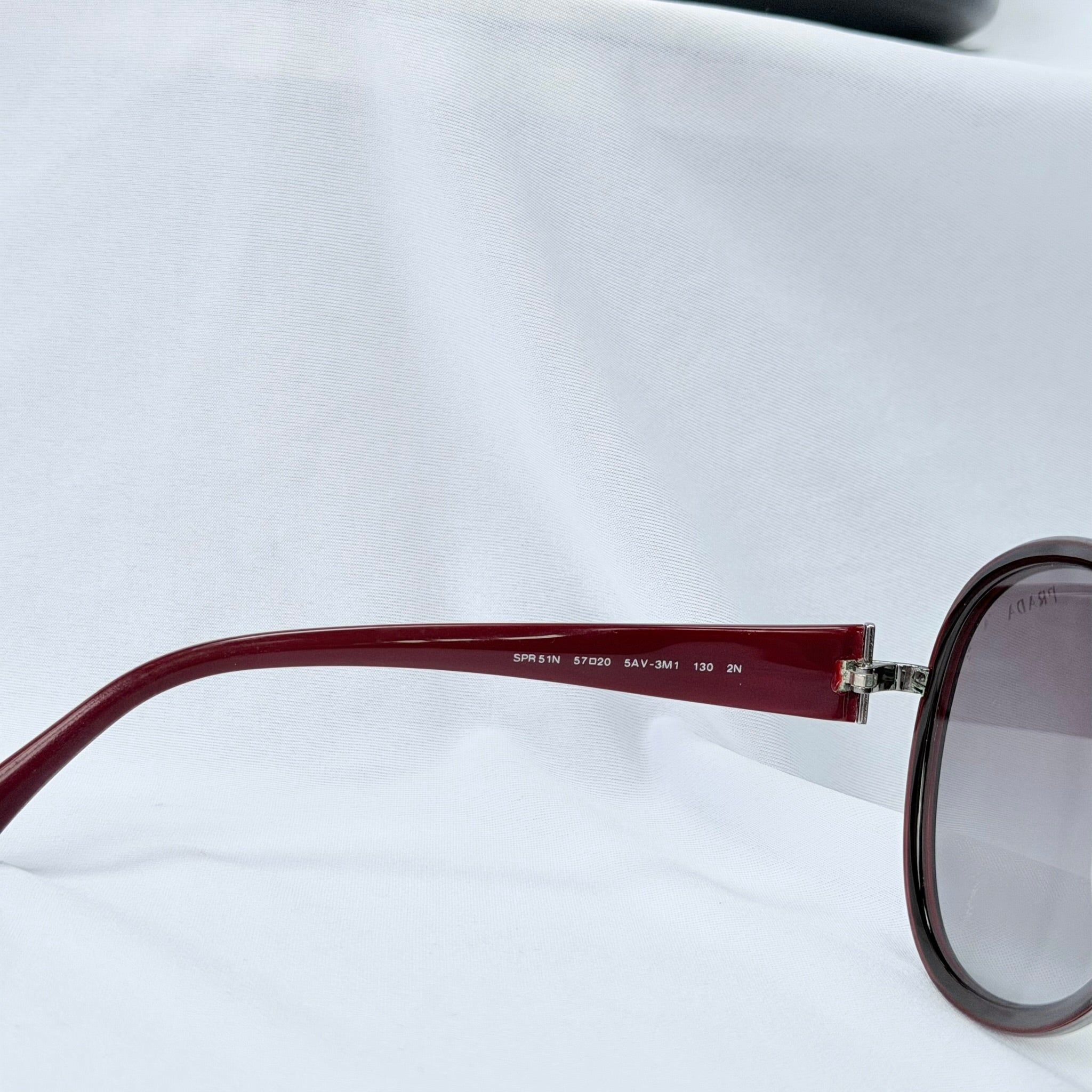 Prada SPR 51N Burgundy Red Striped Arms Oversized Oval Round Women’s Sunglasses