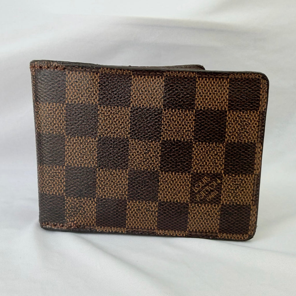 Louis Vuitton Bifold wallet Damier Ebène Coated Canvas Brown Repaired