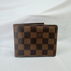Louis Vuitton Bifold wallet Damier Ebène Coated Canvas Brown Repaired