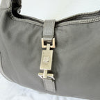 Vintage Gucci Jackie Small Handbag Black Leather And Nylon Piston Push-Lock Silver Closure Single Adjustable Strap