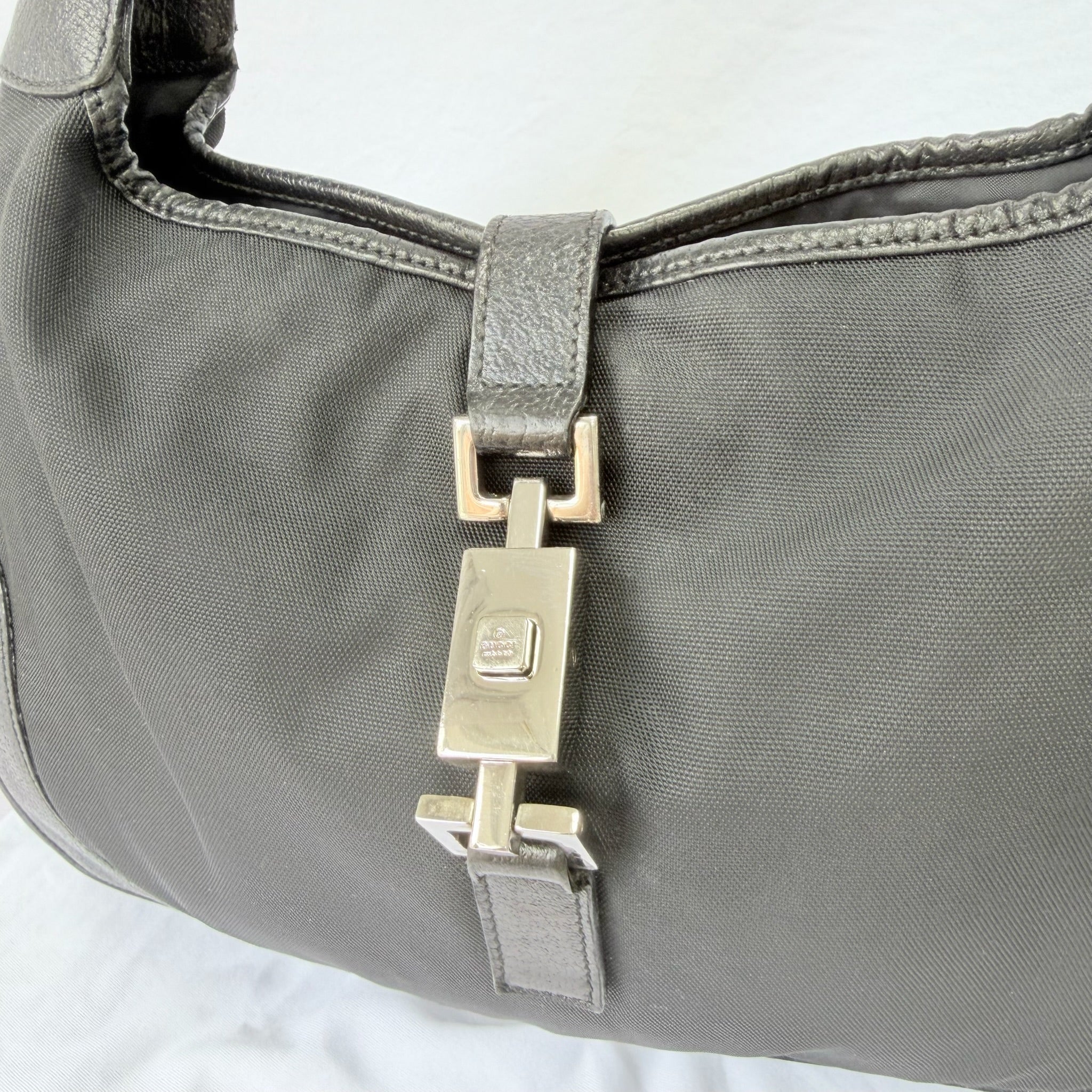 Vintage Gucci Jackie Small Handbag Black Leather And Nylon Piston Push-Lock Silver Closure Single Adjustable Strap