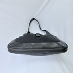 Vintage Gucci Jackie Small Handbag Black Leather And Nylon Piston Push-Lock Silver Closure Single Adjustable Strap
