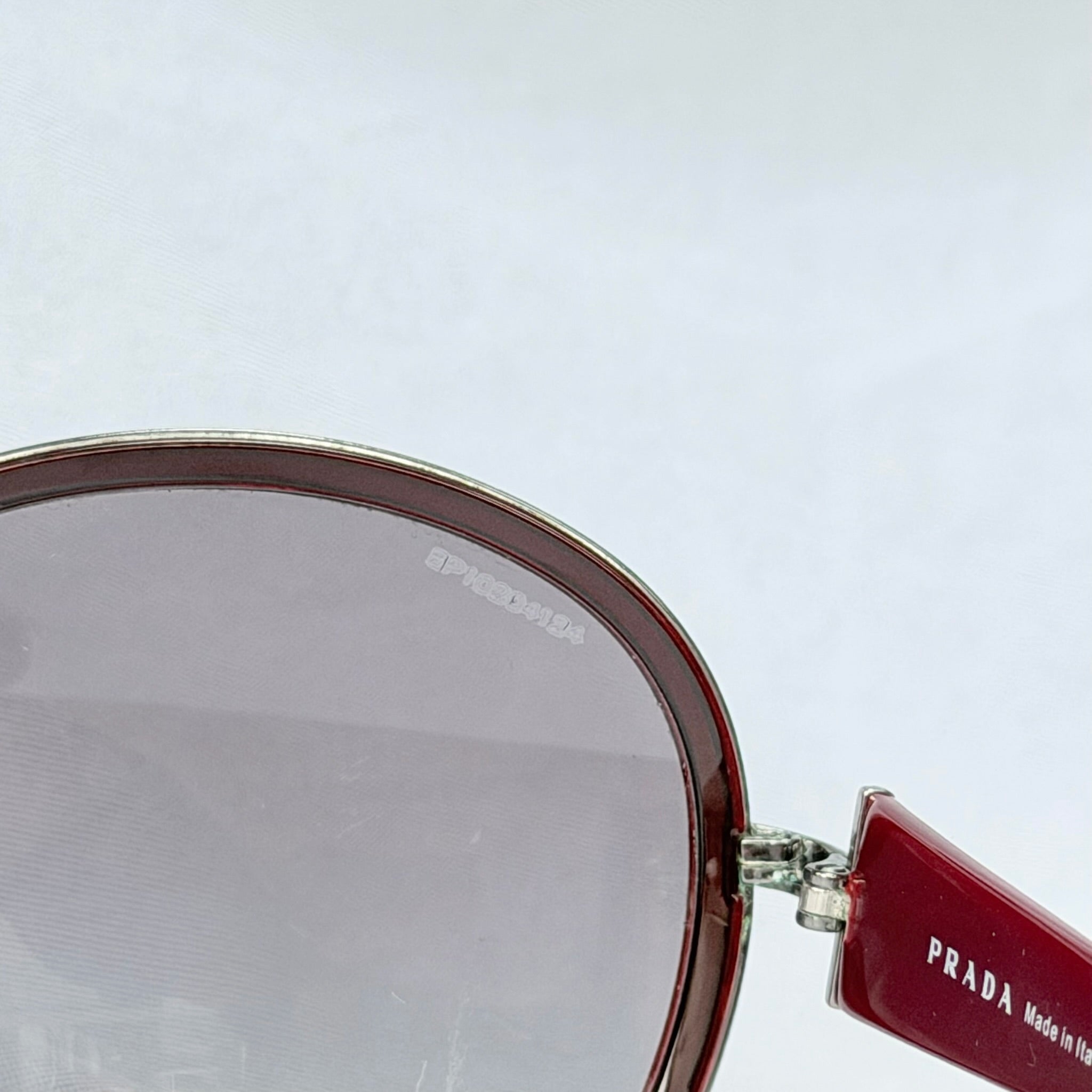 Prada SPR 51N Burgundy Red Striped Arms Oversized Oval Round Women’s Sunglasses