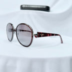 Prada SPR 51N Burgundy Red Striped Arms Oversized Oval Round Women’s Sunglasses