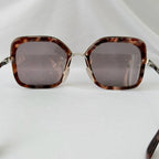 Prada PR 57US Catwalk Cinema Red Tortoiseshell Irregular Oversized Square Sunglasses
