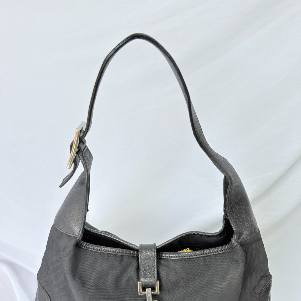 Vintage Gucci Jackie Small Handbag Black Leather And Nylon Piston Push-Lock Silver Closure Single Adjustable Strap