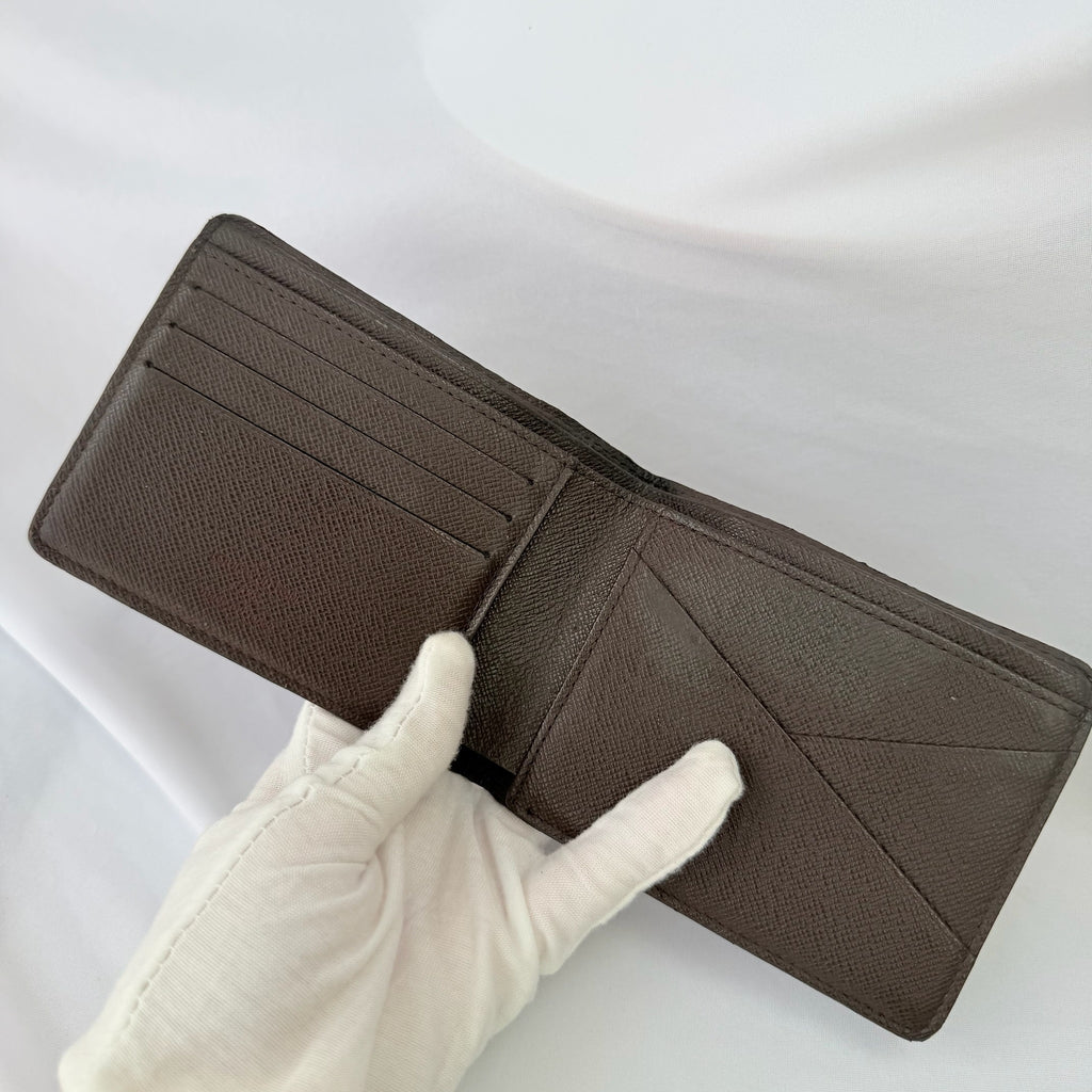 Louis Vuitton Bifold wallet Damier Ebène Coated Canvas Brown Repaired