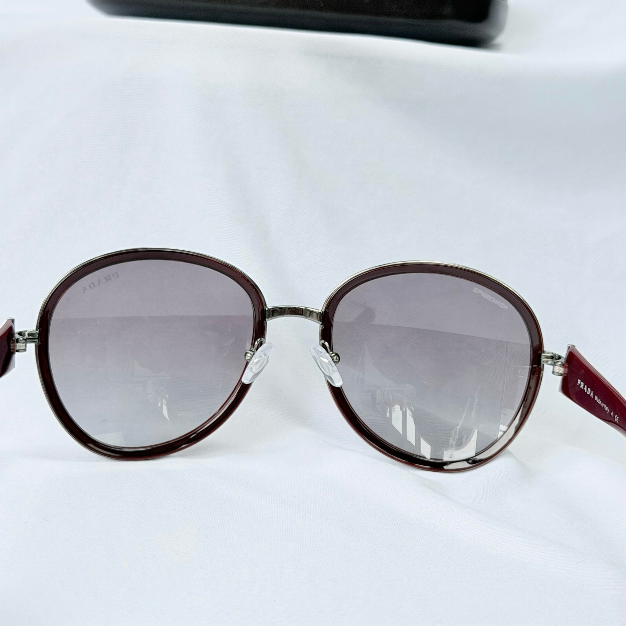 Prada SPR 51N Burgundy Red Striped Arms Oversized Oval Round Women’s Sunglasses
