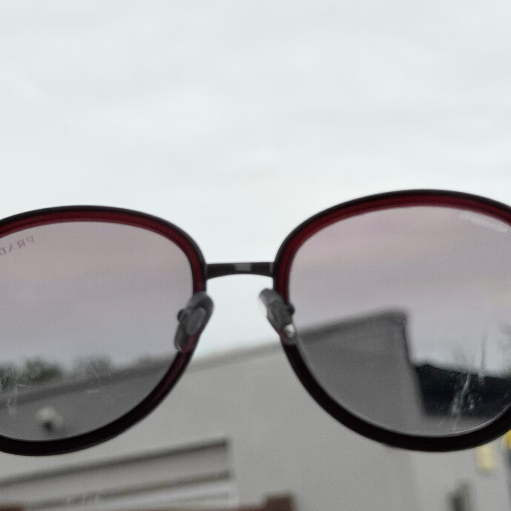 Prada SPR 51N Burgundy Red Striped Arms Oversized Oval Round Women’s Sunglasses