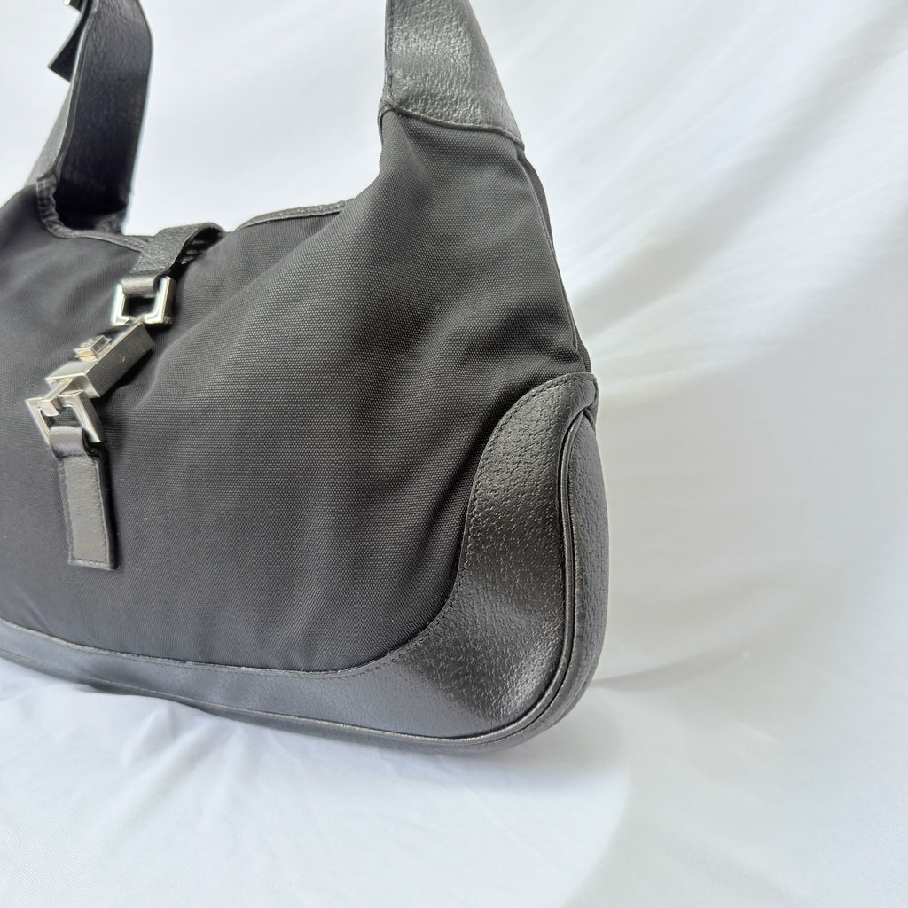 Vintage Gucci Jackie Small Handbag Black Leather And Nylon Piston Push-Lock Silver Closure Single Adjustable Strap