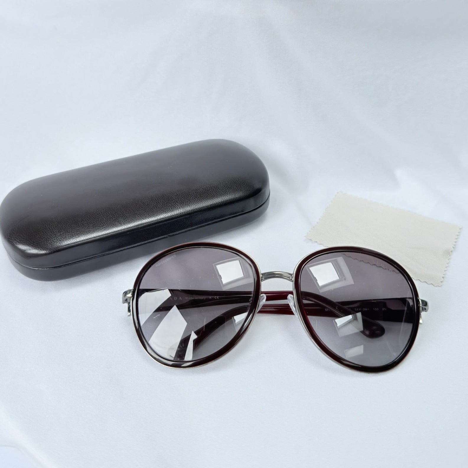 Prada SPR 51N Burgundy Red Striped Arms Oversized Oval Round Women’s Sunglasses