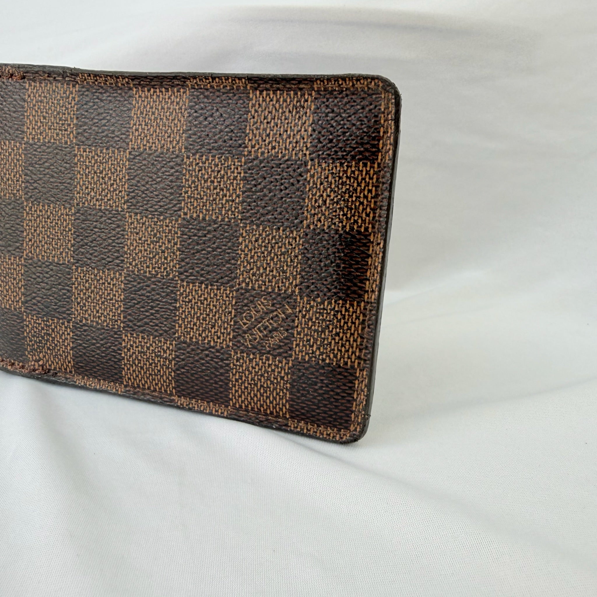 Louis Vuitton Bifold wallet Damier Ebène Coated Canvas Brown Repaired