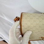 Vintage Gucci GG Supreme Monogram Small Leather Coated Canvas Beige Tan Cream Crossbody Turn Lock Handbag